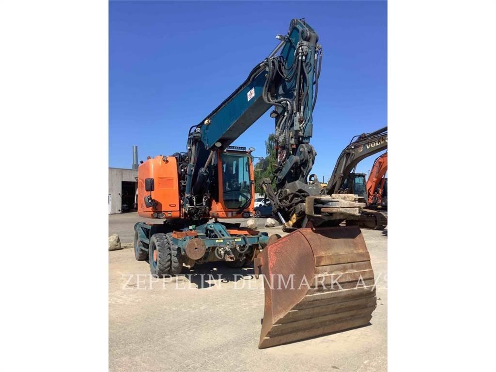 CAT M315DOEM Kolová rýpadla