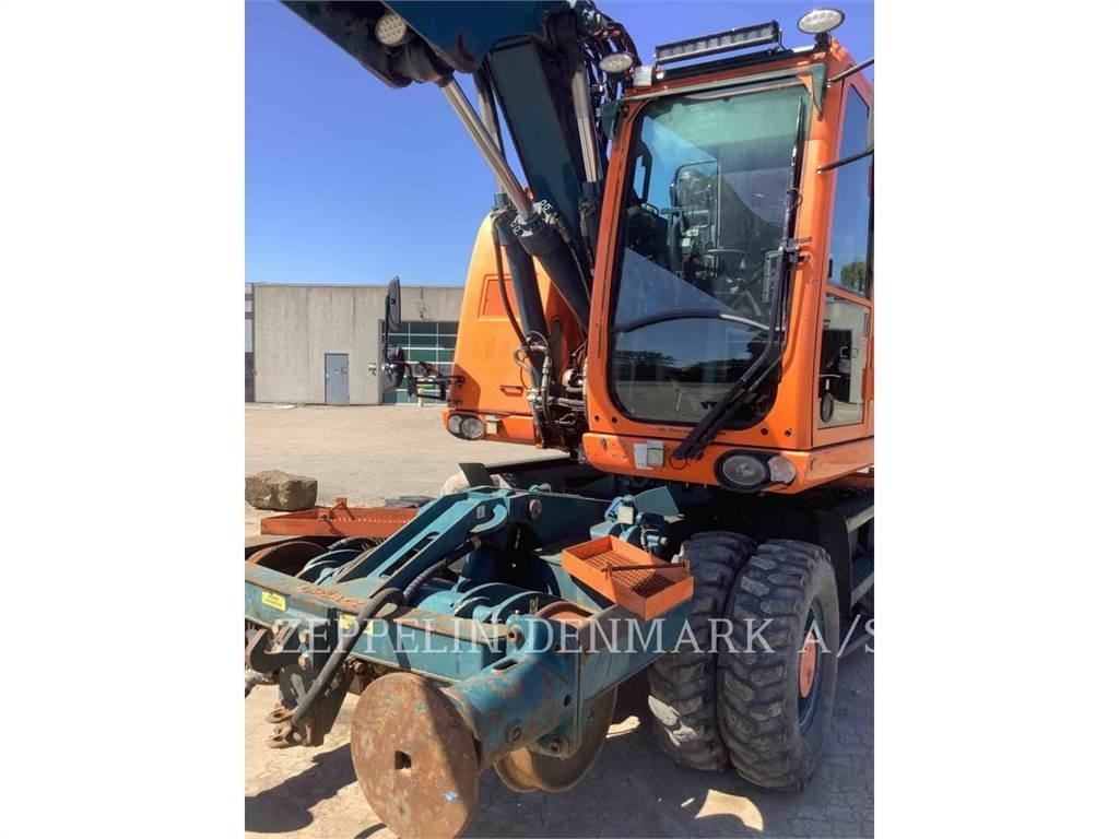 CAT M315DOEM Kolová rýpadla