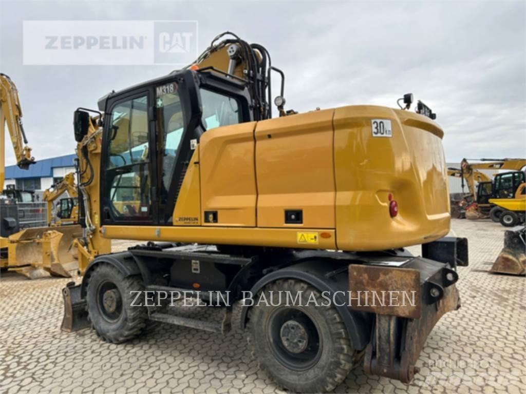 CAT M318-07A Kolová rýpadla