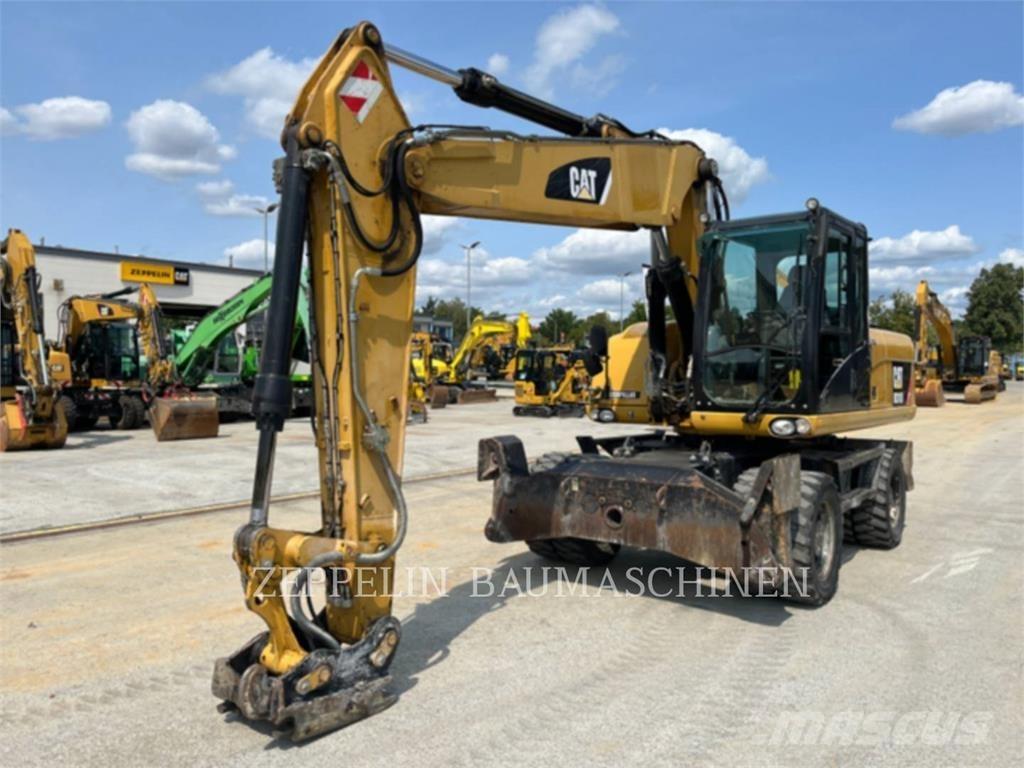 CAT M318D Kolová rýpadla