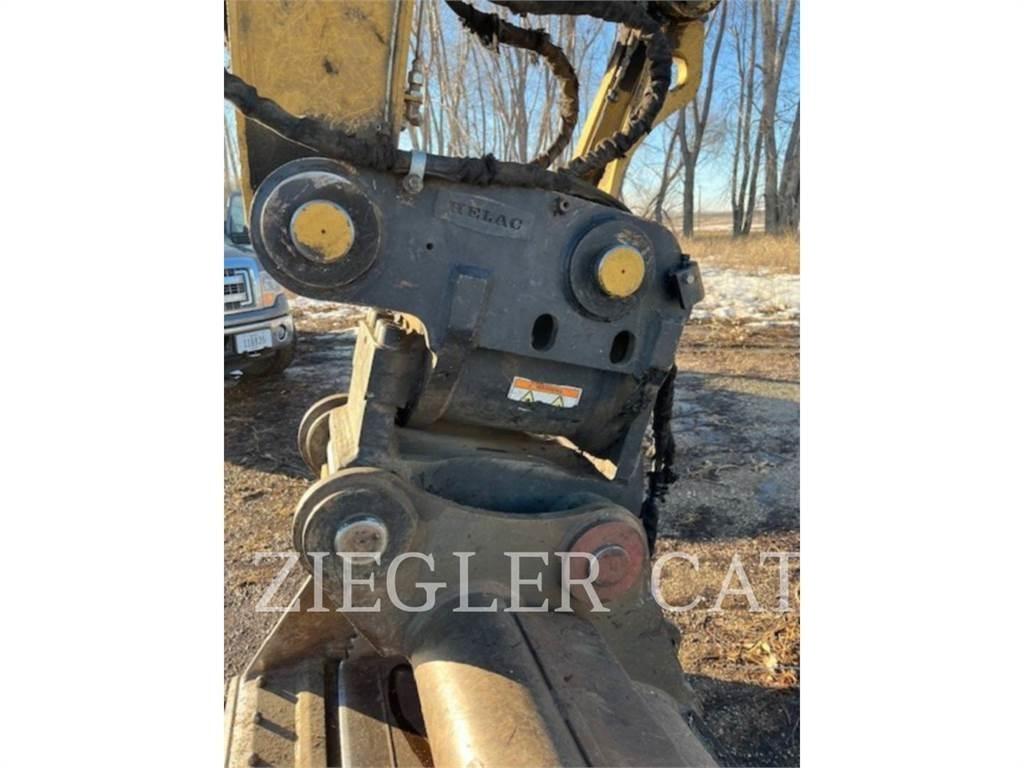 CAT M320F Kolová rýpadla