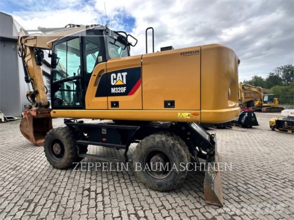 CAT M320F Kolová rýpadla