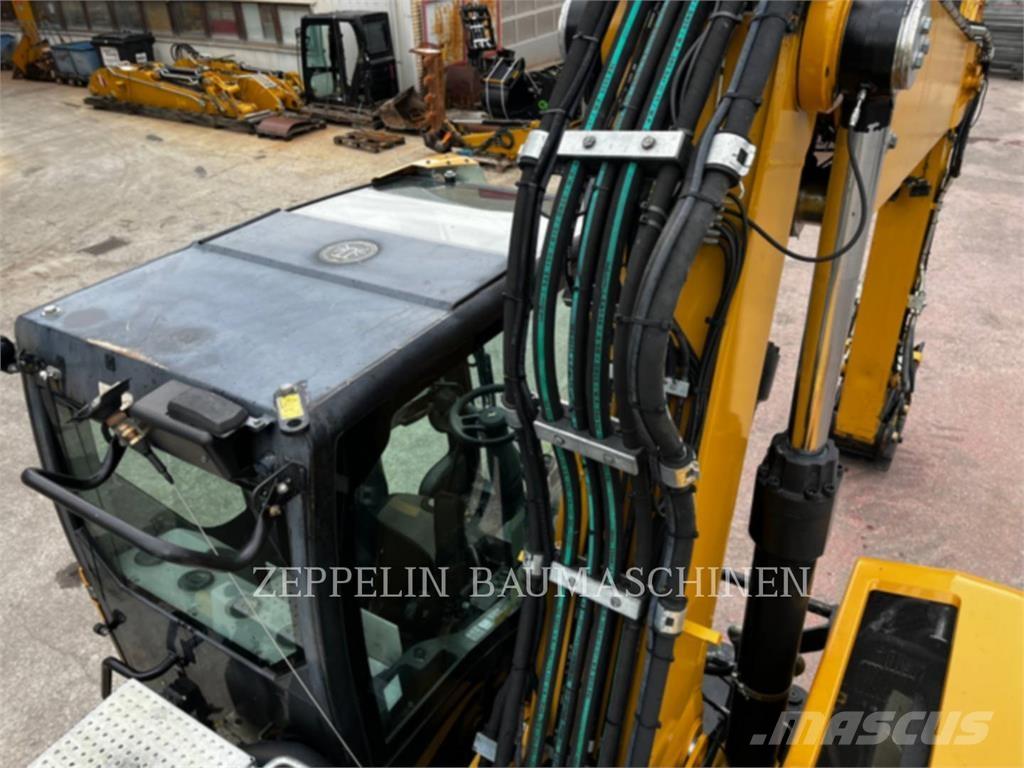 CAT M320F Kolová rýpadla