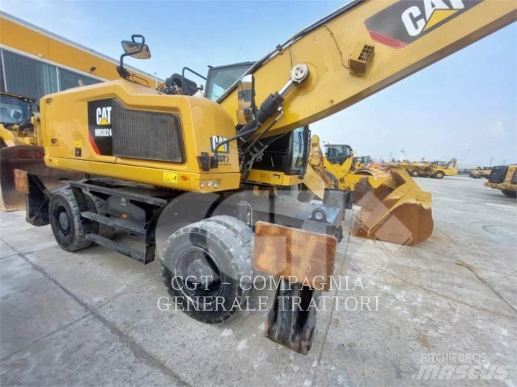CAT MH3024 Kolová rýpadla