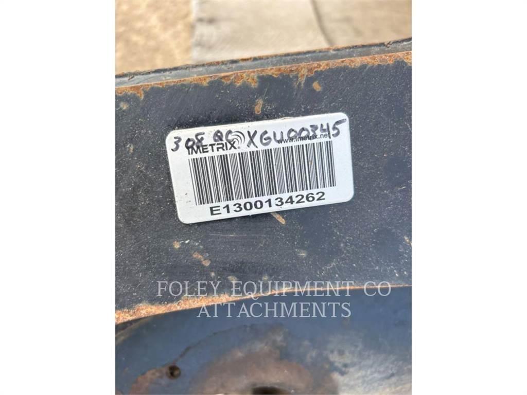 CAT QC308 Pásová rýpadla