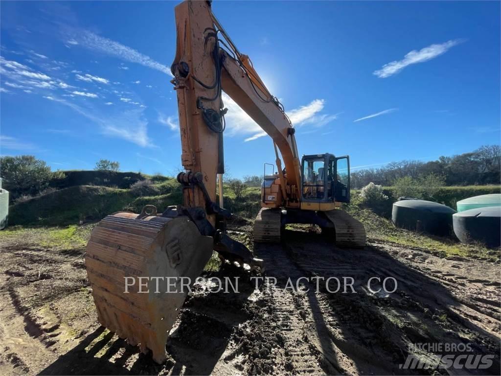 New Holland CX225 Pásová rýpadla