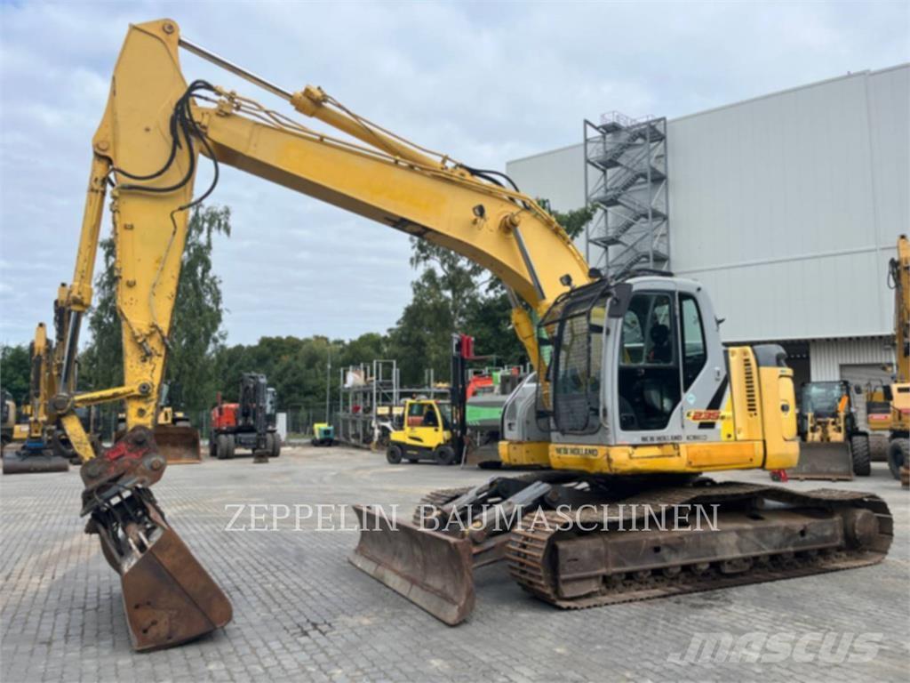 New Holland E235 Pásová rýpadla