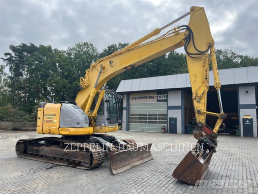 New Holland E235 Pásová rýpadla