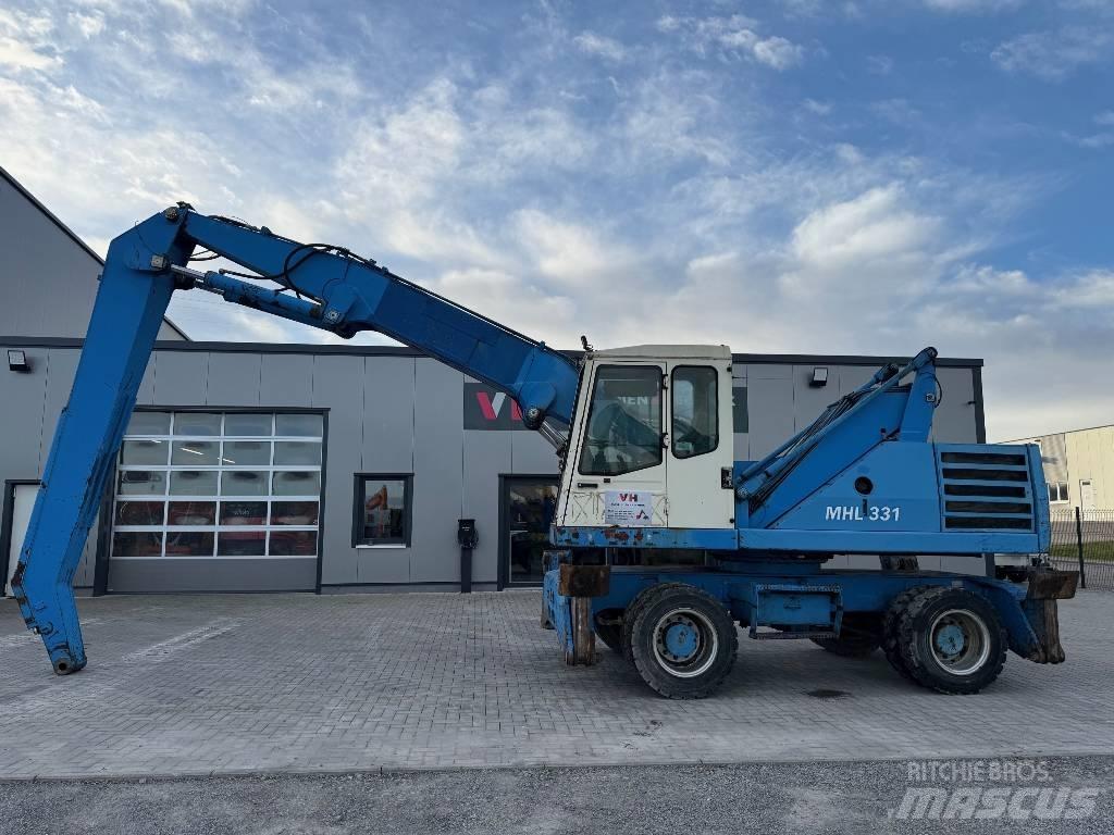 Fuchs MHL 331 Stroje pro manipulaci s odpadem