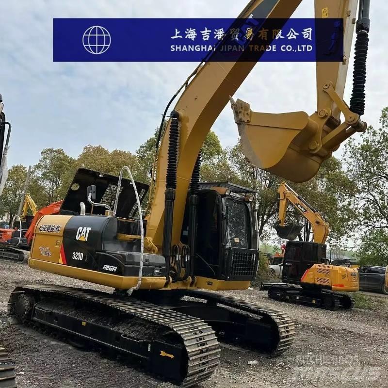 CAT 323 D Pásová rýpadla