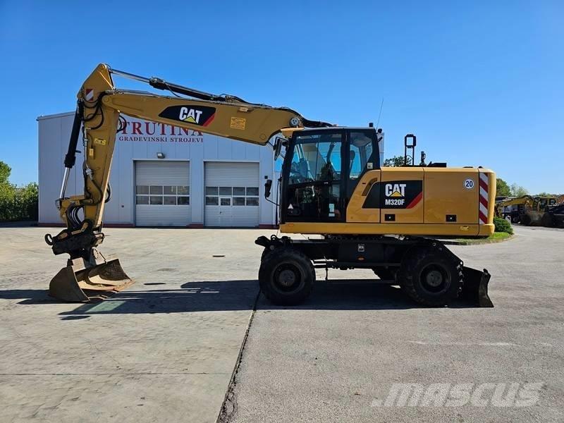 CAT M 320F Kolová rýpadla