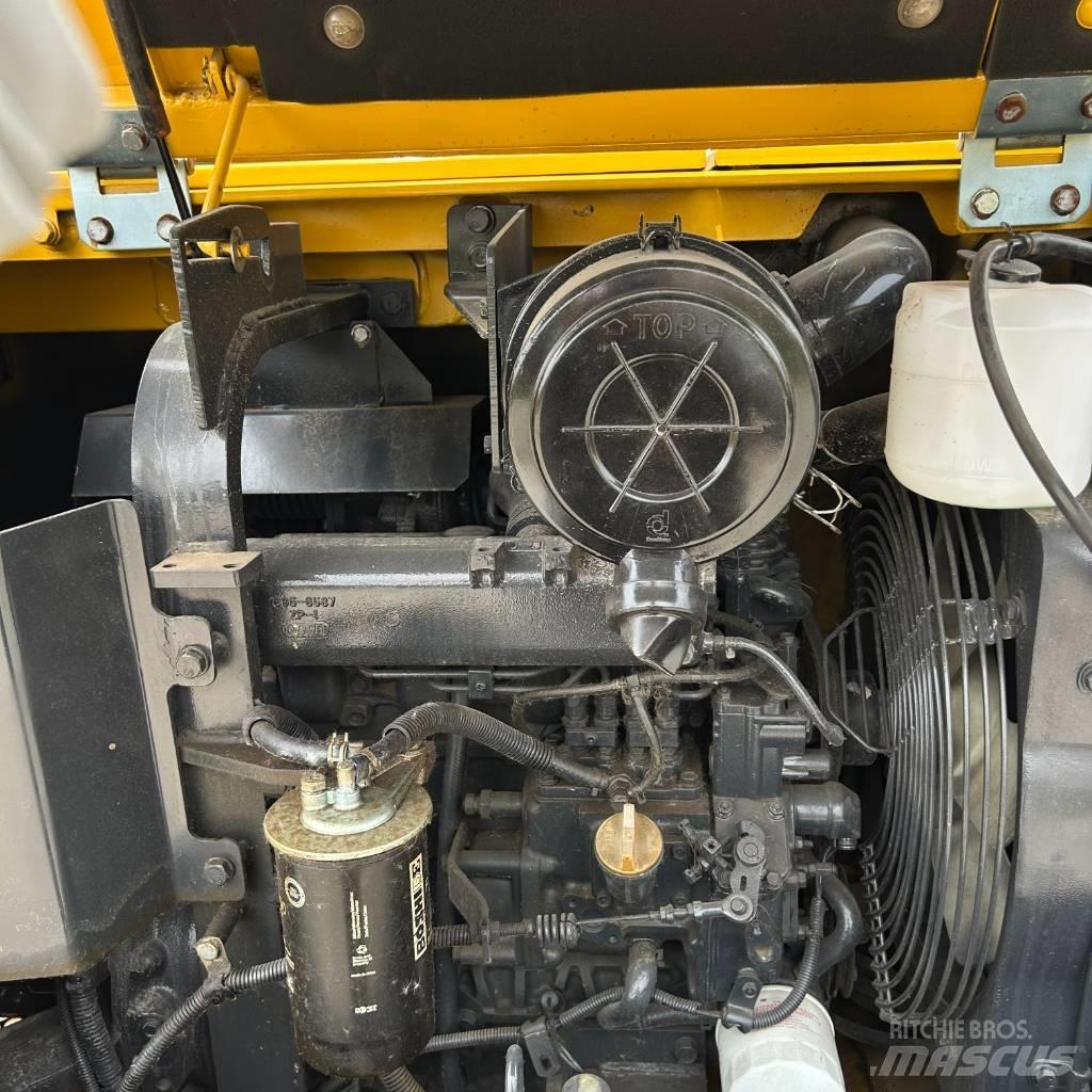 Komatsu 56-7 Pásová rýpadla