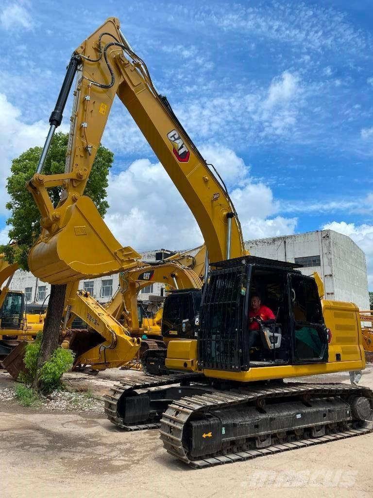 CAT 323 Midi rýpadla 7t - 12t