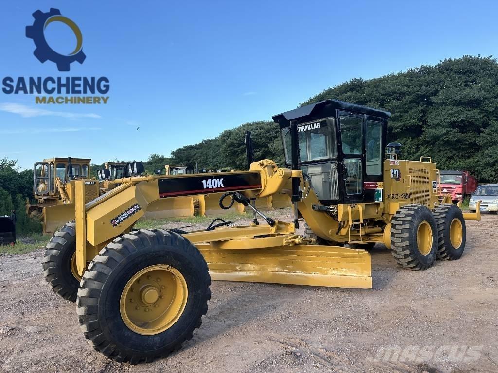 CAT 140K Grejdry