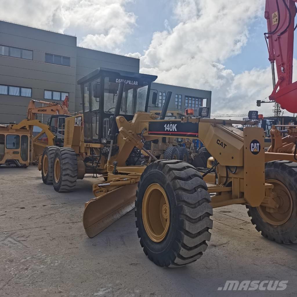 CAT 140k Grejdry