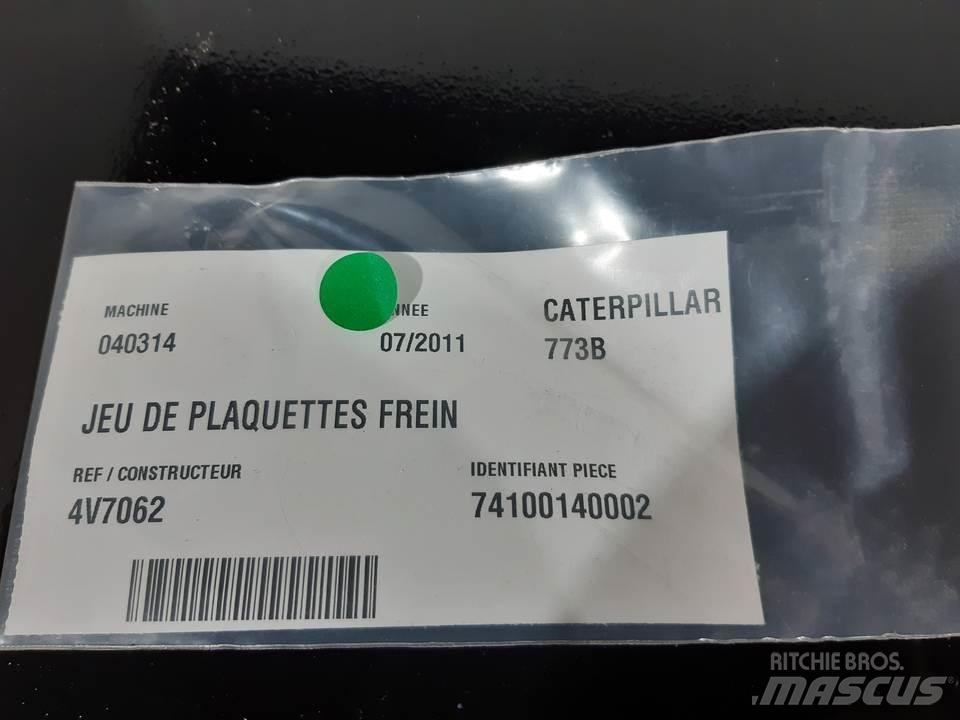 CAT 773B Pásy, řetězy a podvozek