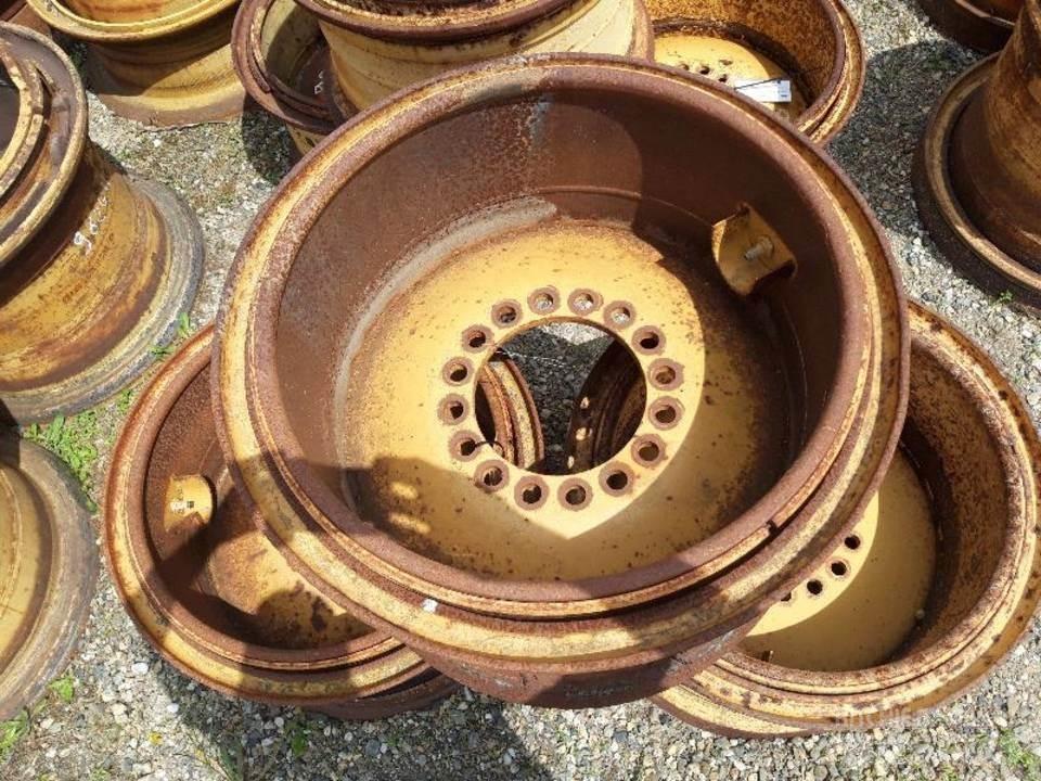 CAT 938G Pásy, řetězy a podvozek