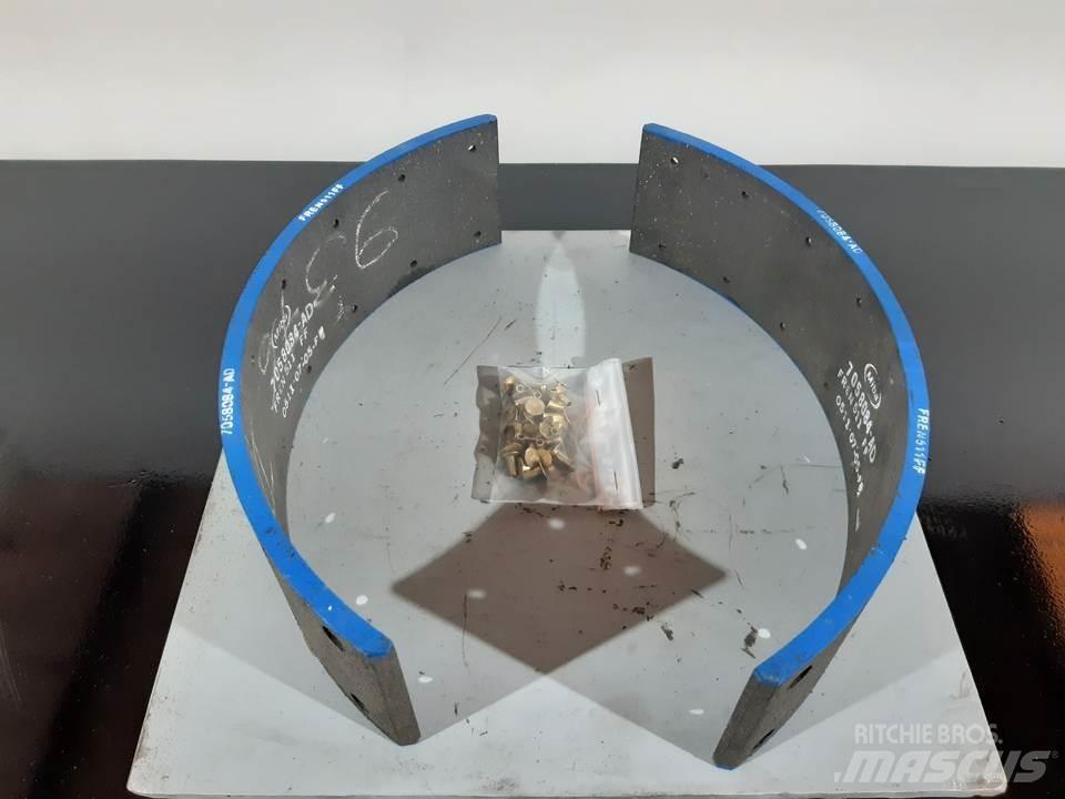 CAT 950 Pásy, řetězy a podvozek