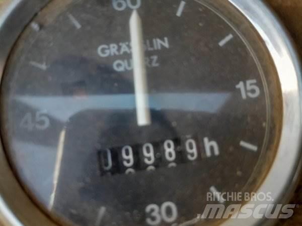 Fuchs 713 Stroje pro manipulaci s odpadem