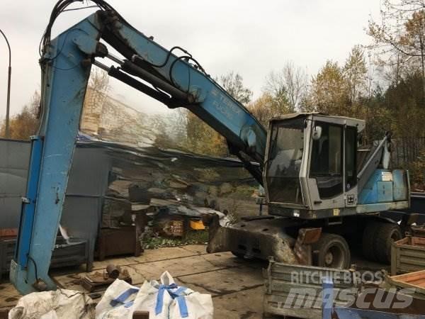 Fuchs MHL 320 Stroje pro manipulaci s odpadem