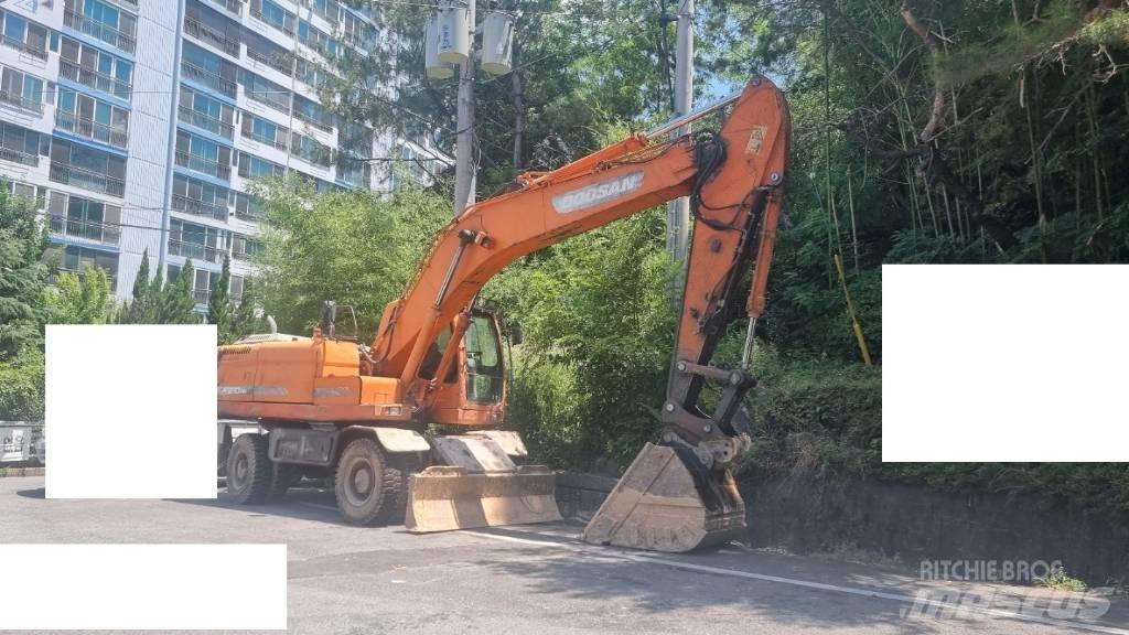 Doosan DX 210 W Kolová rýpadla