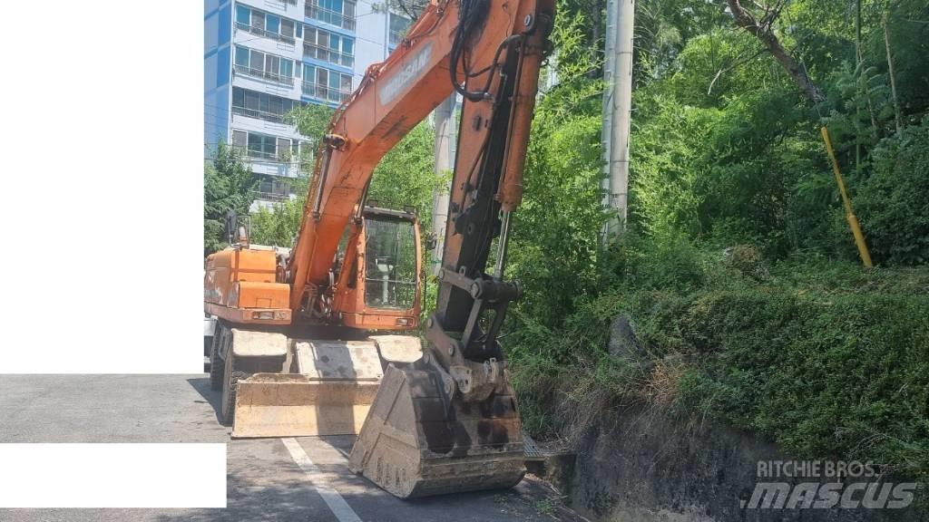 Doosan DX 210 W Kolová rýpadla