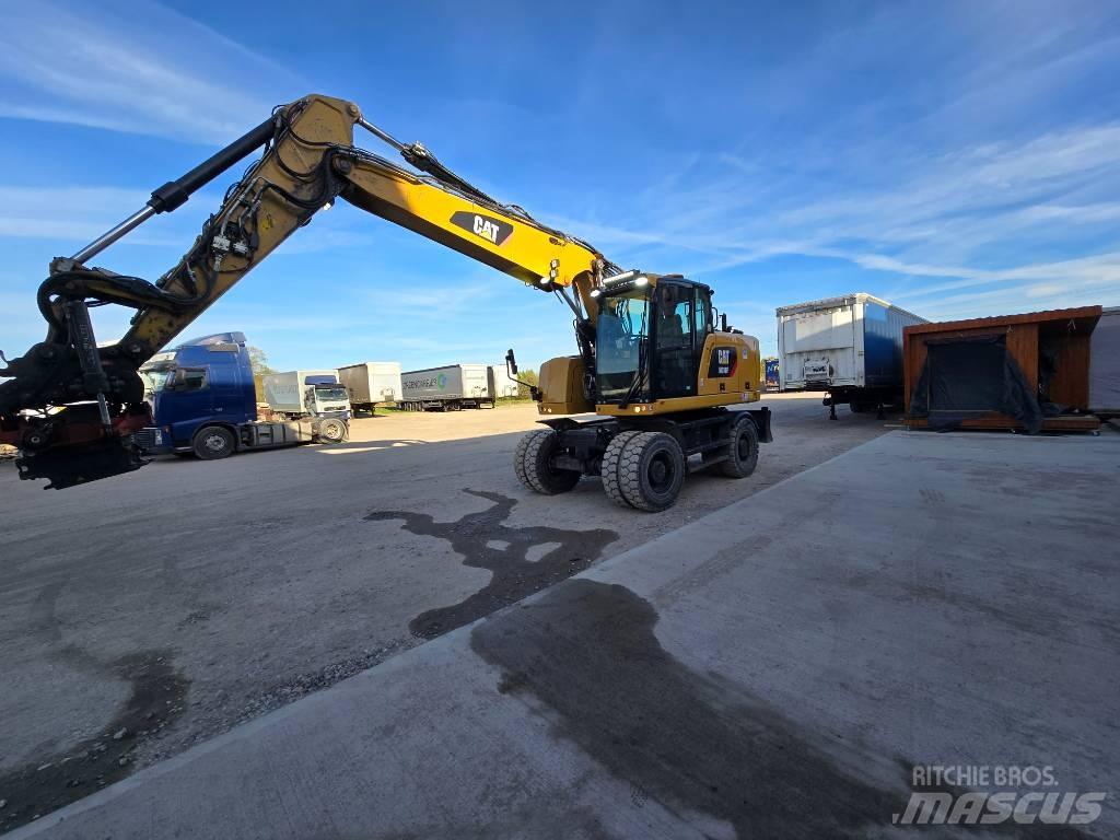 CAT 318 Kolová rýpadla