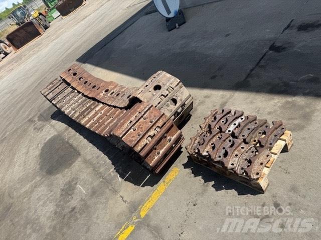 CAT 953 C PODWOZIE Pásy, řetězy a podvozek