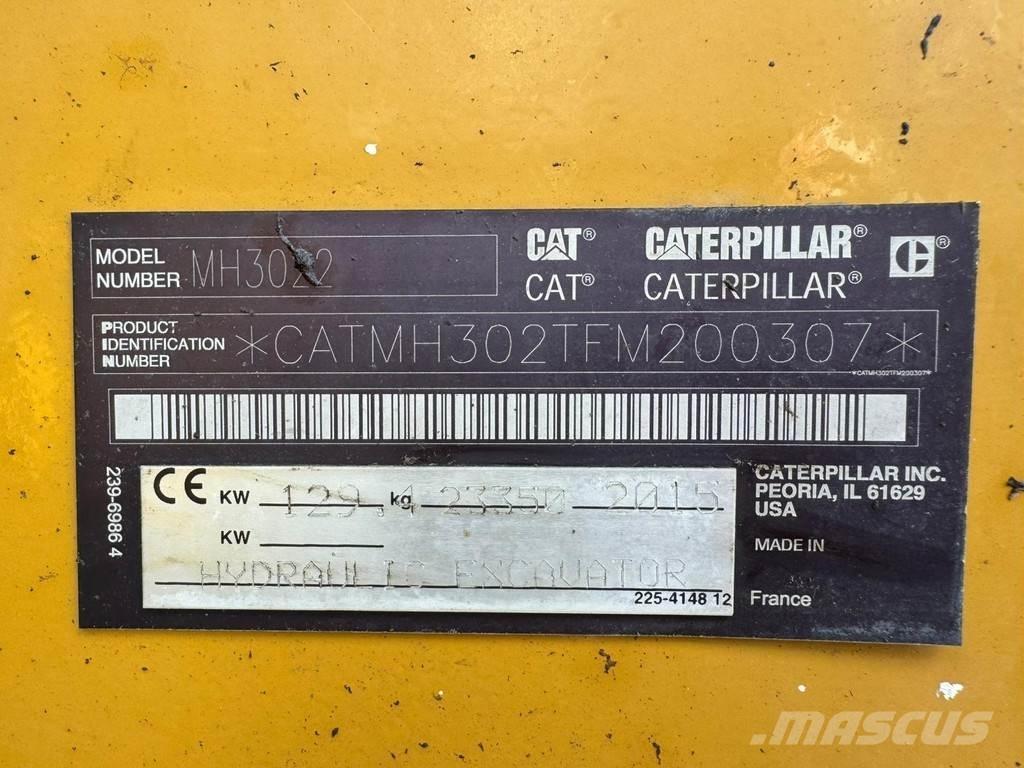 CAT MH3022 Stroje pro manipulaci s odpadem