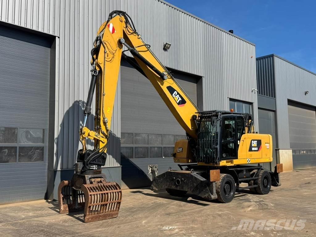 CAT MH3022 Stroje pro manipulaci s odpadem