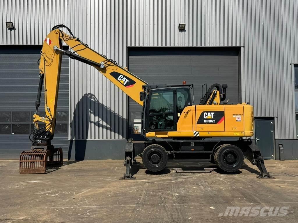 CAT MH3022 Stroje pro manipulaci s odpadem