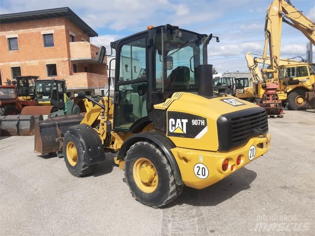 CAT 907H Kolové nakladače