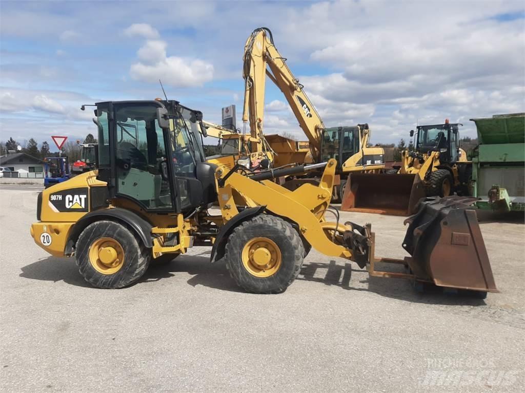 CAT 907H Kolové nakladače
