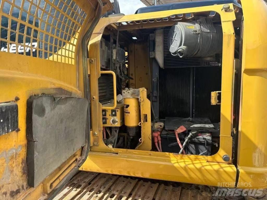 CAT 312 D Pásová rýpadla