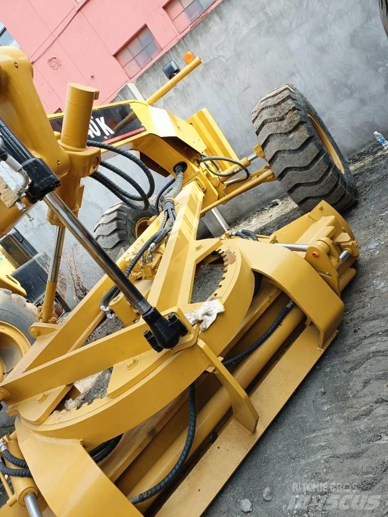 CAT 140K Grejdry