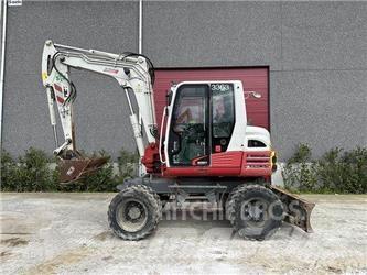 Takeuchi TB295W Kolová rýpadla