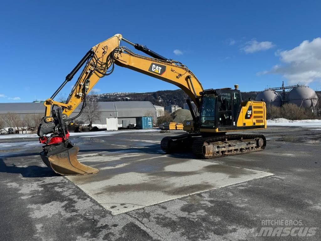 CAT 323 NG Pásová rýpadla