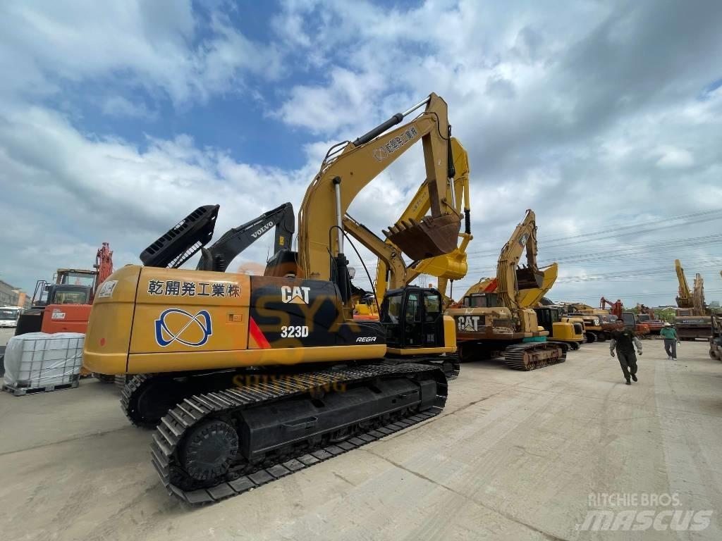 CAT 323 D Pásová rýpadla