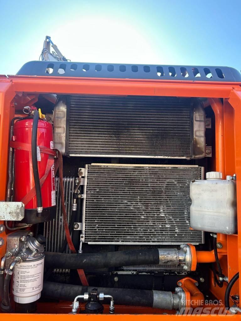 Doosan DX 210 W Kolová rýpadla
