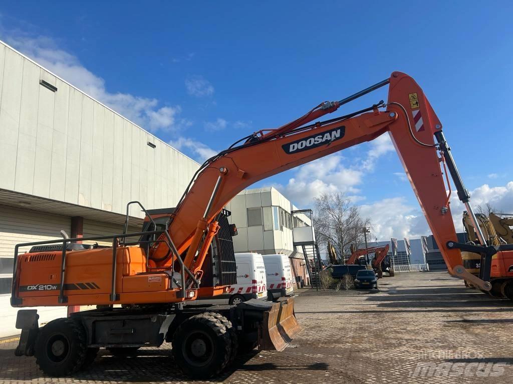 Doosan DX 210 W Kolová rýpadla