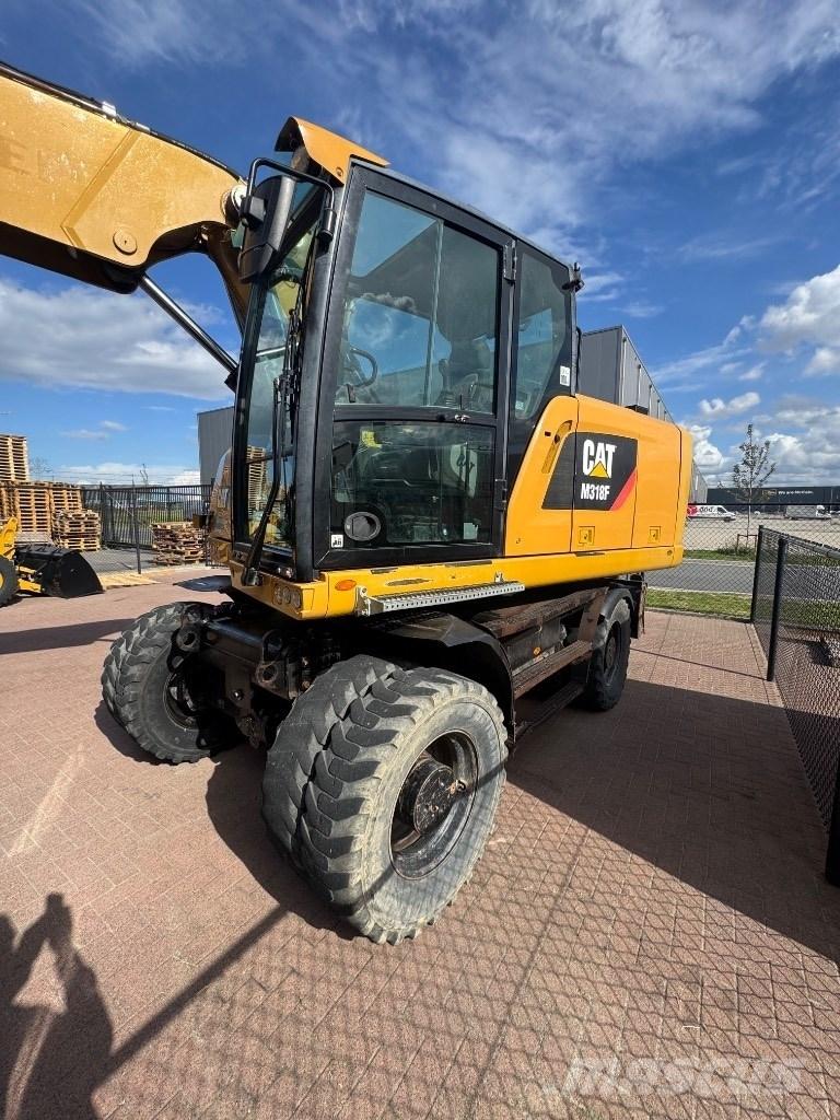 CAT 318 Kolová rýpadla
