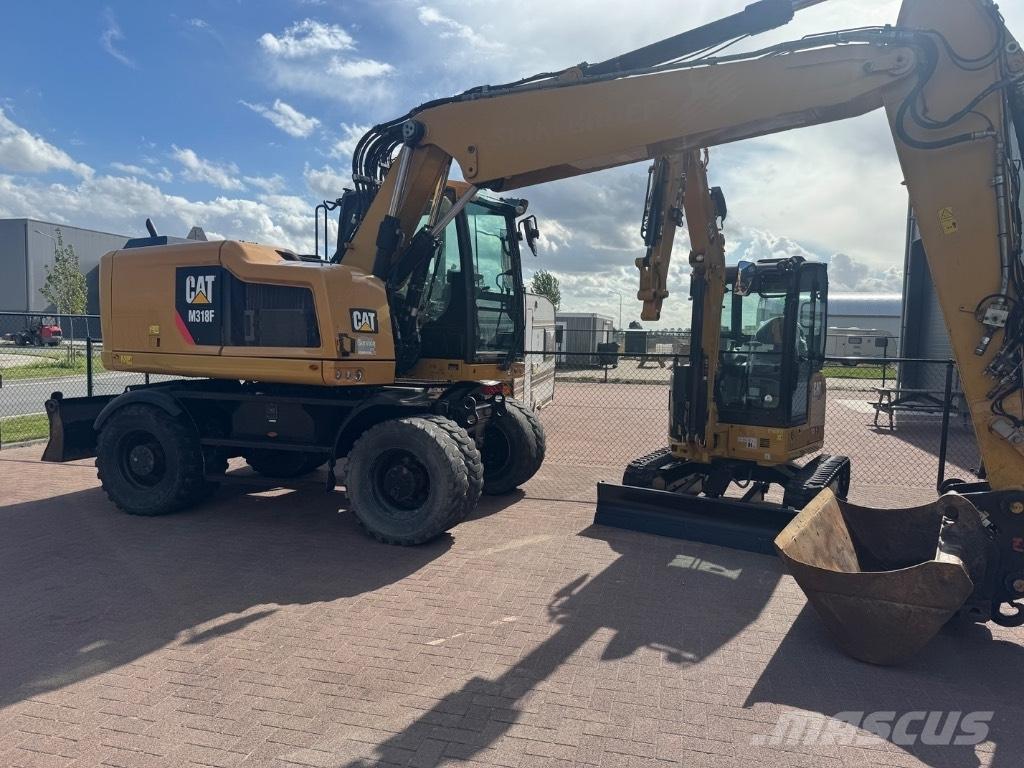 CAT 318 Kolová rýpadla