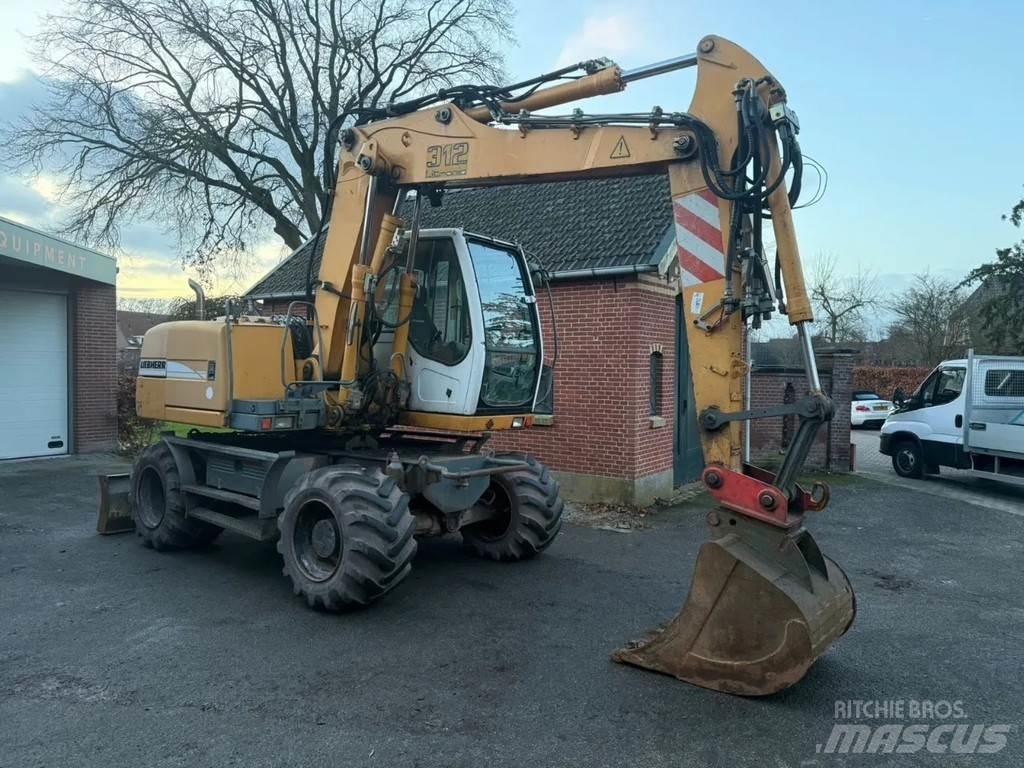 Liebherr A312 Kolová rýpadla