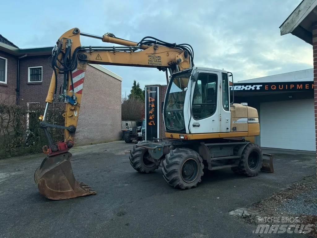 Liebherr A312 Kolová rýpadla