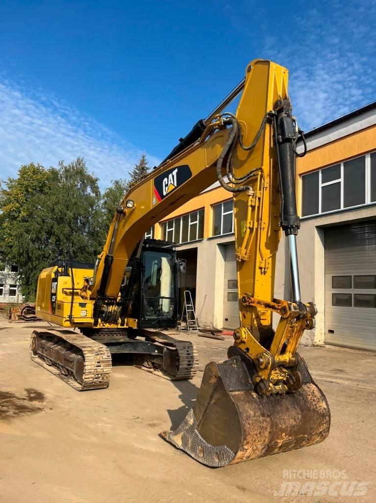 CAT 323 F LN Pásová rýpadla