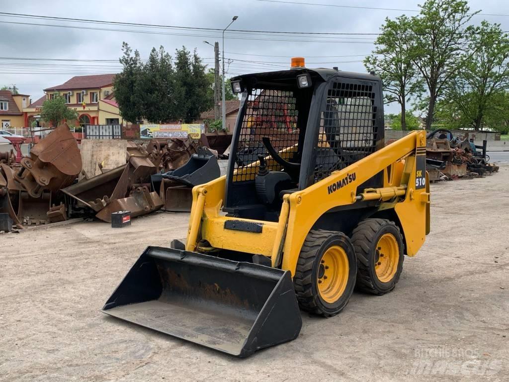 Komatsu SK 510 Smykem řízené nakladače