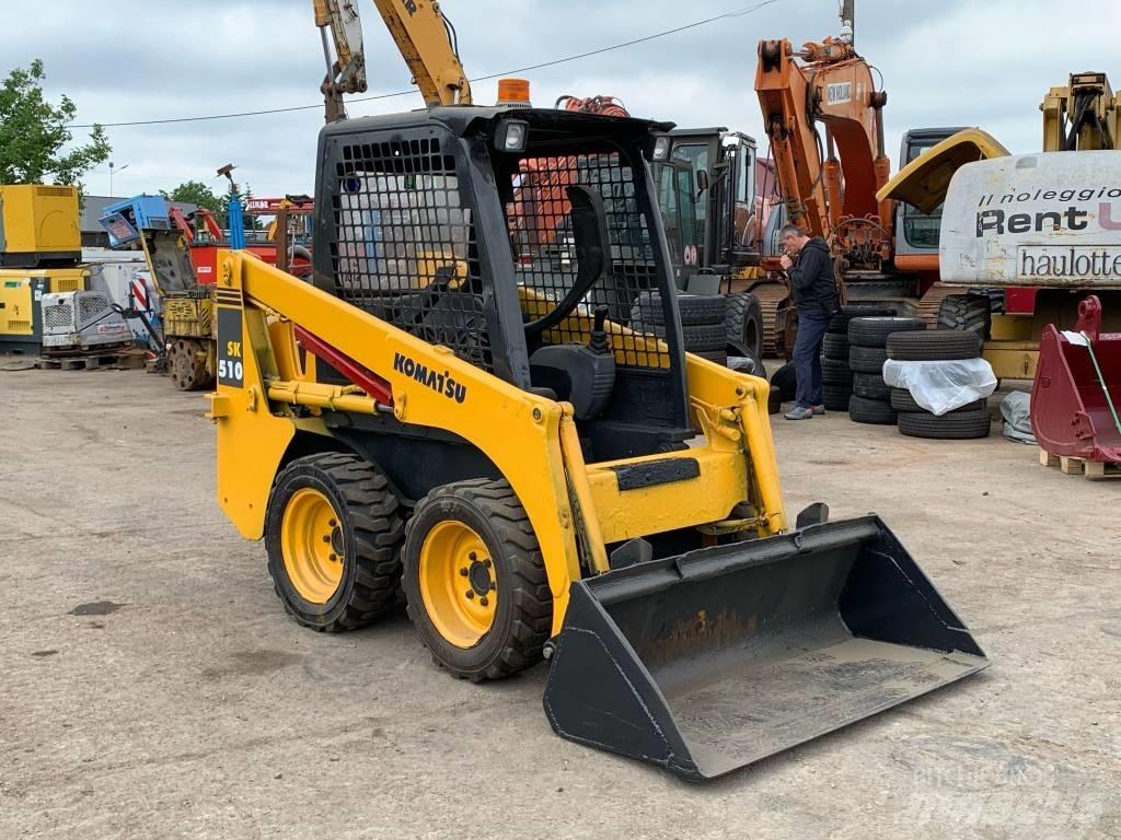 Komatsu SK 510 Smykem řízené nakladače