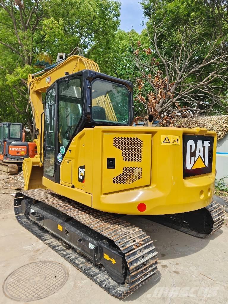 CAT 310 Pásová rýpadla
