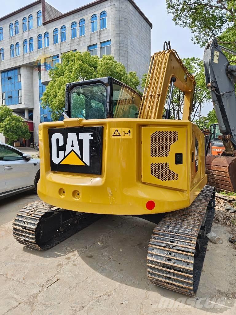 CAT 310 Pásová rýpadla