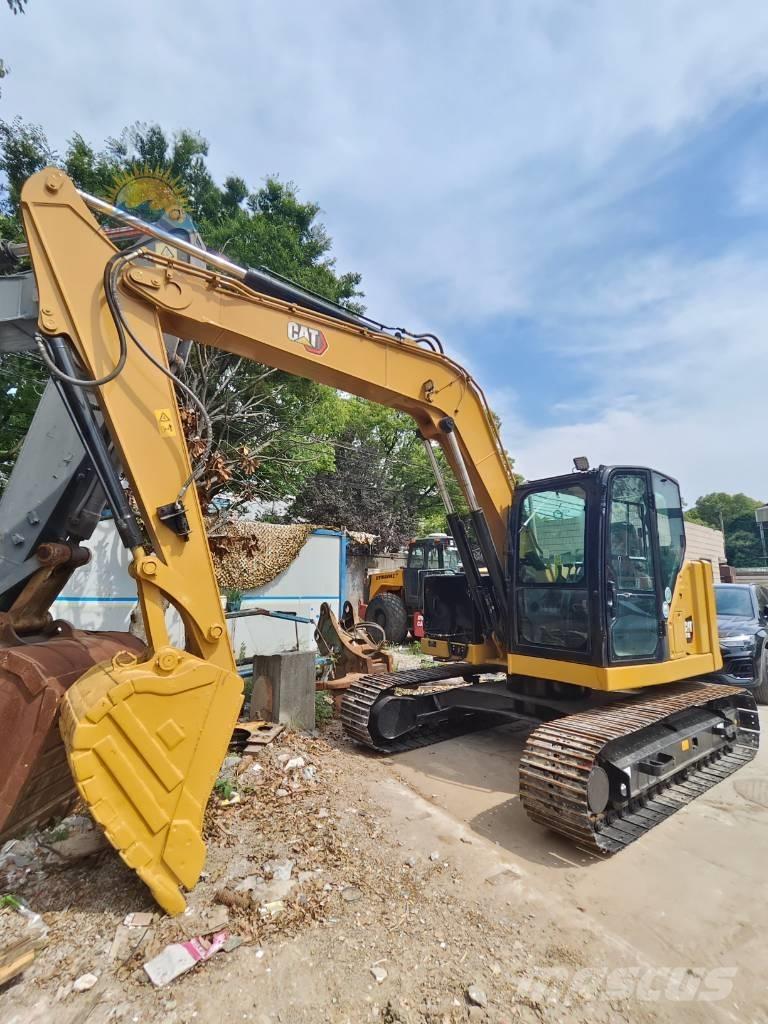 CAT 310 Pásová rýpadla